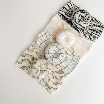 Tiny Knot Co's black and white zebra print headbands.