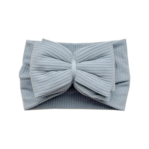 An Ellie - Bamboo Baby Knotted Headwrap with a Tiny Knot Co bow.